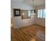 Dining area with hardwood flooring and light fixtures at 2260 Rugged Mesa Dr, Laughlin, NV 89029
