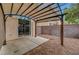 Backyard featuring a covered patio and rock landscaping at 2649 Heathrow St, Las Vegas, NV 89135