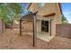 Inviting backyard features a shaded pergola and access to the home's interior through sliding glass doors at 2649 Heathrow St, Las Vegas, NV 89135