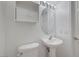 Bright bathroom features a pedestal sink and modern fixtures at 2649 Heathrow St, Las Vegas, NV 89135