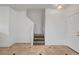 Inviting entryway showcases neutral tile flooring and staircase access at 2649 Heathrow St, Las Vegas, NV 89135