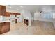 Eat-in kitchen features wood cabinets, tile floors and white appliances at 2649 Heathrow St, Las Vegas, NV 89135