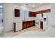 Well-lit kitchen features wooden cabinets, white countertops, and modern appliances at 2649 Heathrow St, Las Vegas, NV 89135