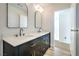 Modern bathroom with double sink vanity and brushed gold hardware at 2727 Scotch Heather St, Las Vegas, NV 89142