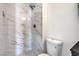 Modern bathroom with marble-tiled shower and updated fixtures at 2727 Scotch Heather St, Las Vegas, NV 89142