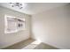 Bedroom featuring carpet, natural lighting and a large window at 2727 Scotch Heather St, Las Vegas, NV 89142