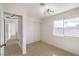 Bedroom featuring carpet, natural light, and closet with sliding doors at 2727 Scotch Heather St, Las Vegas, NV 89142