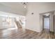 Open-concept living area with modern fixtures and luxury wood flooring at 2727 Scotch Heather St, Las Vegas, NV 89142
