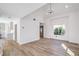 Bright living room with modern fixtures and luxury wood flooring at 2727 Scotch Heather St, Las Vegas, NV 89142
