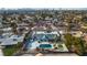 Stunning aerial view of a renovated home with a pool and putting green, nestled in a vibrant community at 2749 Horseshoe Dr, Las Vegas, NV 89120