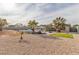 Expansive backyard with desert landscaping, putting green, pool, and a charming single-story home at 2749 Horseshoe Dr, Las Vegas, NV 89120