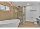 Bathroom with modern fixtures, freestanding tub, and glass shower at 2749 Horseshoe Dr, Las Vegas, NV 89120