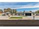 Charming single story home featuring a well-manicured front yard, gravel landscaping, and a spacious driveway at 2749 Horseshoe Dr, Las Vegas, NV 89120