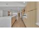 Bright and airy kitchen featuring a large island, stainless steel appliances, and wood-grain cabinetry at 2749 Horseshoe Dr, Las Vegas, NV 89120