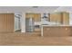Bright kitchen with new appliances and view of modern refrigerator at 2749 Horseshoe Dr, Las Vegas, NV 89120