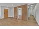 Living space with laminate flooring and doorway at 2749 Horseshoe Dr, Las Vegas, NV 89120