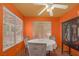 Cozy dining room features a round table, plush chairs, and natural light from large windows at 2819 Prickley Pear Dr, Henderson, NV 89074