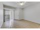 Bright bedroom offers a ceiling fan and a sliding glass door to the outside at 2975 Bluegrass Ln # 811, Henderson, NV 89074