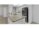 Bright kitchen features stone countertops, white cabinetry, and modern appliances, perfect for cooking and entertaining at 2975 Bluegrass Ln # 811, Henderson, NV 89074
