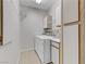 Functional laundry room features washer, dryer, and cabinets, making laundry chores convenient at 2975 Bluegrass Ln # 811, Henderson, NV 89074