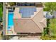 Aerial view of the roof with solar panels, pool, jacuzzi, and patio at 3057 Sunrise Heights Dr, Henderson, NV 89052