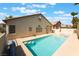 Backyard featuring a pool, jacuzzi, and patio that are perfect for outdoor living at 3057 Sunrise Heights Dr, Henderson, NV 89052