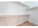 Walk-in closet featuring built-in shelving and ample storage space at 3057 Sunrise Heights Dr, Henderson, NV 89052