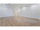 Bright living room with wood floors, white walls, recessed lighting, and archway at 3057 Sunrise Heights Dr, Henderson, NV 89052