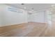 Spacious living room featuring wood floors, recessed lighting, and archway at 3057 Sunrise Heights Dr, Henderson, NV 89052