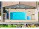 Stunning aerial view of sparkling pool with hot tub at 3057 Sunrise Heights Dr, Henderson, NV 89052