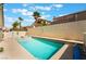 Private pool with a jacuzzi, a tanning ledge, a deck, and a privacy wall at 3057 Sunrise Heights Dr, Henderson, NV 89052