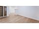 Hallway view featuring hardwood floors and white walls at 3057 Sunrise Heights Dr, Henderson, NV 89052