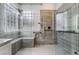Custom shower featuring a bench, rainfall showerhead, and glass block window at 3057 Sunrise Heights Dr, Henderson, NV 89052