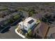 Aerial view of a modern home nestled in a residential area, outlined for emphasis on the property at 3062 Echoed Rondel Ln, Henderson, NV 89044
