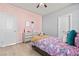 Cozy bedroom with stylish decor, light wood floors, and a comfortable bed at 3062 Echoed Rondel Ln, Henderson, NV 89044