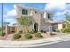 Attractive two-story home with arched entry, two car garage, and landscaped front yard at 3062 Echoed Rondel Ln, Henderson, NV 89044