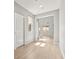 Bright hallway with wood floors, ample natural light, and high ceilings creating an airy space at 3062 Echoed Rondel Ln, Henderson, NV 89044