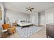 Bright main bedroom with wood floors, neutral walls, lots of closet space and modern furniture at 3062 Echoed Rondel Ln, Henderson, NV 89044