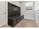 Mudroom with a large bench, hooks, and storage cabinets; perfect for organization and convenience at 3062 Echoed Rondel Ln, Henderson, NV 89044