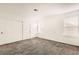 Bright bedroom featuring plush carpet, white walls, and a spacious closet at 3314 Astoria Dr, Las Vegas, NV 89121