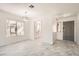 Bright dining room featuring marble-like tile flooring and an open layout at 3314 Astoria Dr, Las Vegas, NV 89121