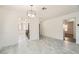 Bright dining room featuring marble-like tile flooring and an open layout at 3314 Astoria Dr, Las Vegas, NV 89121