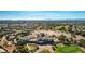 Aerial view of the community center, golf course and landscape at 3335 American Mustang Ct, Las Vegas, NV 89122