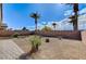 Well maintained backyard features a rockscape and desert landscaping, providing an open outdoor space at 3335 American Mustang Ct, Las Vegas, NV 89122