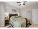Bedroom with neutral walls, ceiling fan, and coordinated decor at 3335 American Mustang Ct, Las Vegas, NV 89122
