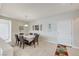 Traditional dining room with neutral color scheme, tile floors and stylish decor at 3335 American Mustang Ct, Las Vegas, NV 89122