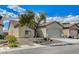 Charming single-story home showcasing low-maintenance desert landscaping, a two-car garage, and a neatly paved driveway at 3335 American Mustang Ct, Las Vegas, NV 89122