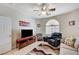 Cozy living room featuring ample seating, neutral walls and lots of light at 3335 American Mustang Ct, Las Vegas, NV 89122
