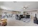Expansive open-concept living space featuring living room, kitchen and breakfast nook at 3335 American Mustang Ct, Las Vegas, NV 89122