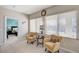 Sitting area with two chairs, lamp table, and view to a bedroom at 3335 American Mustang Ct, Las Vegas, NV 89122